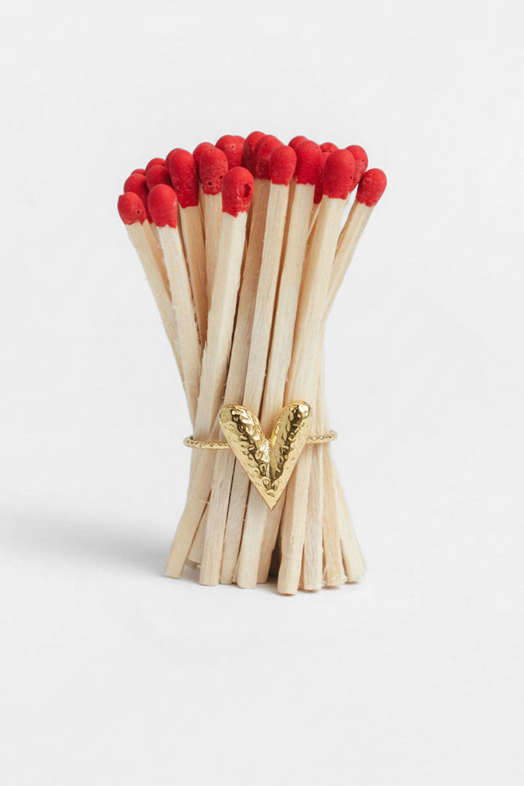 Ring with hammered structure heart