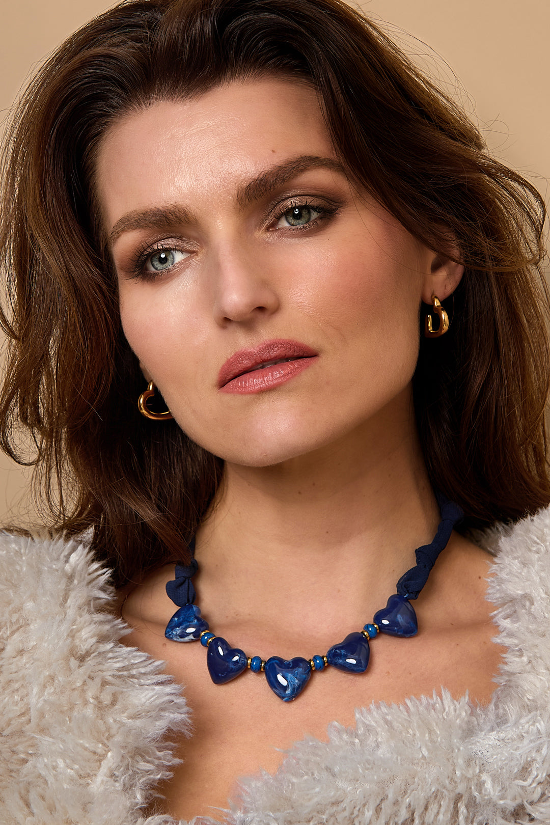 Fabric necklace with heart beads