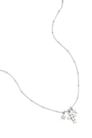 Necklace with cross and star charms